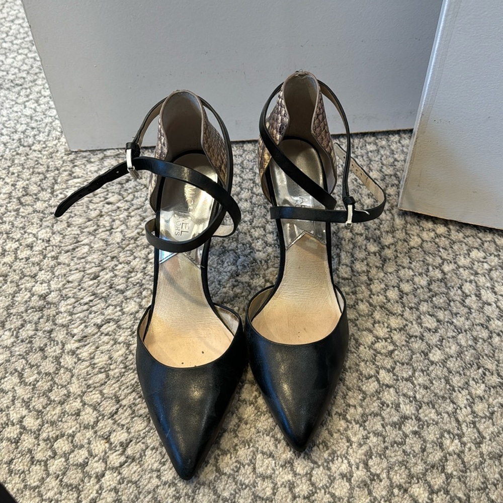 Black and snake skin X heel